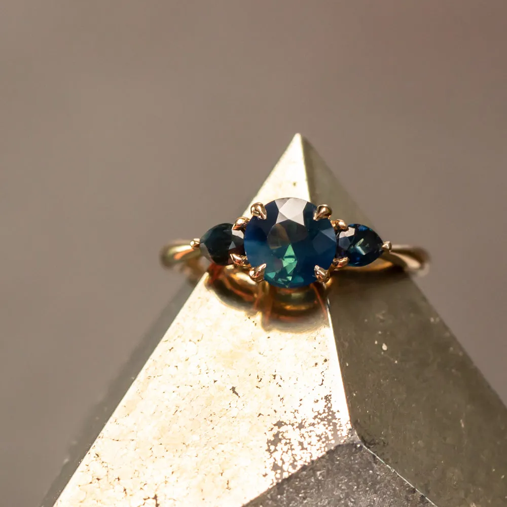 1.03ct Untreated Teal Nigerian Sapphire Three Stone Ring in 18K Yellow Gold